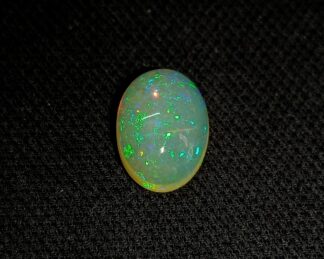 Natural Ethiopian Welo Fire Opal cabochon 14.4x10.6MM  4.60 Carats, Multi Fire Ethiopian Opal.